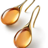 Crystal drop earrings in gold and silver