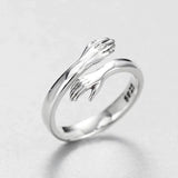 Silver adjustable hug ring